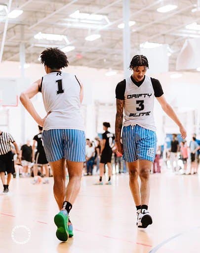Two creators between games in HoopGang shorts